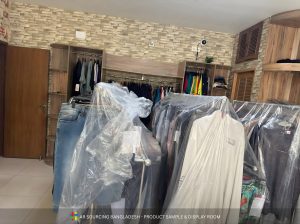 Clothing racks covered in plastic