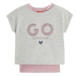 Girl wearing a long-sleeve double-layered graphic t-shirt with unicorn print.